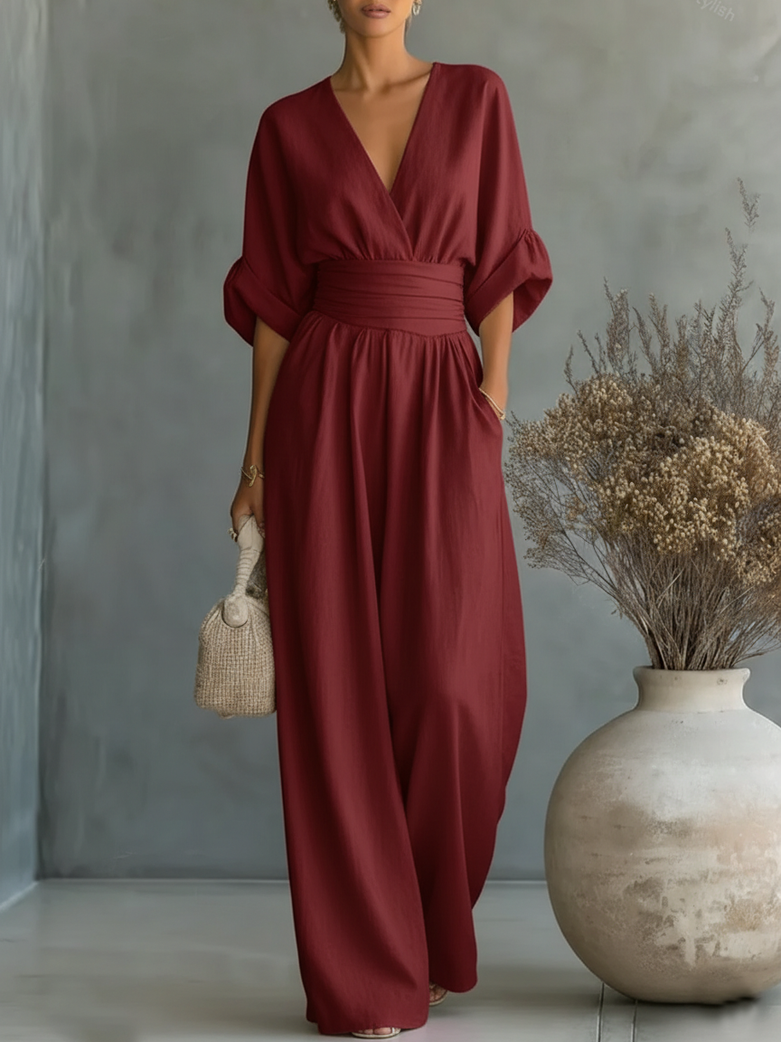 Elegante tuta a vita alta con scollo a V