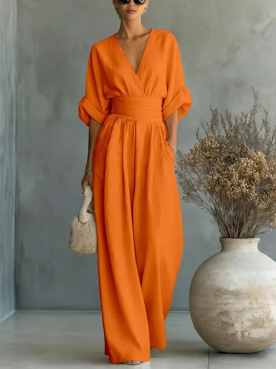 Elegante tuta a vita alta con scollo a V