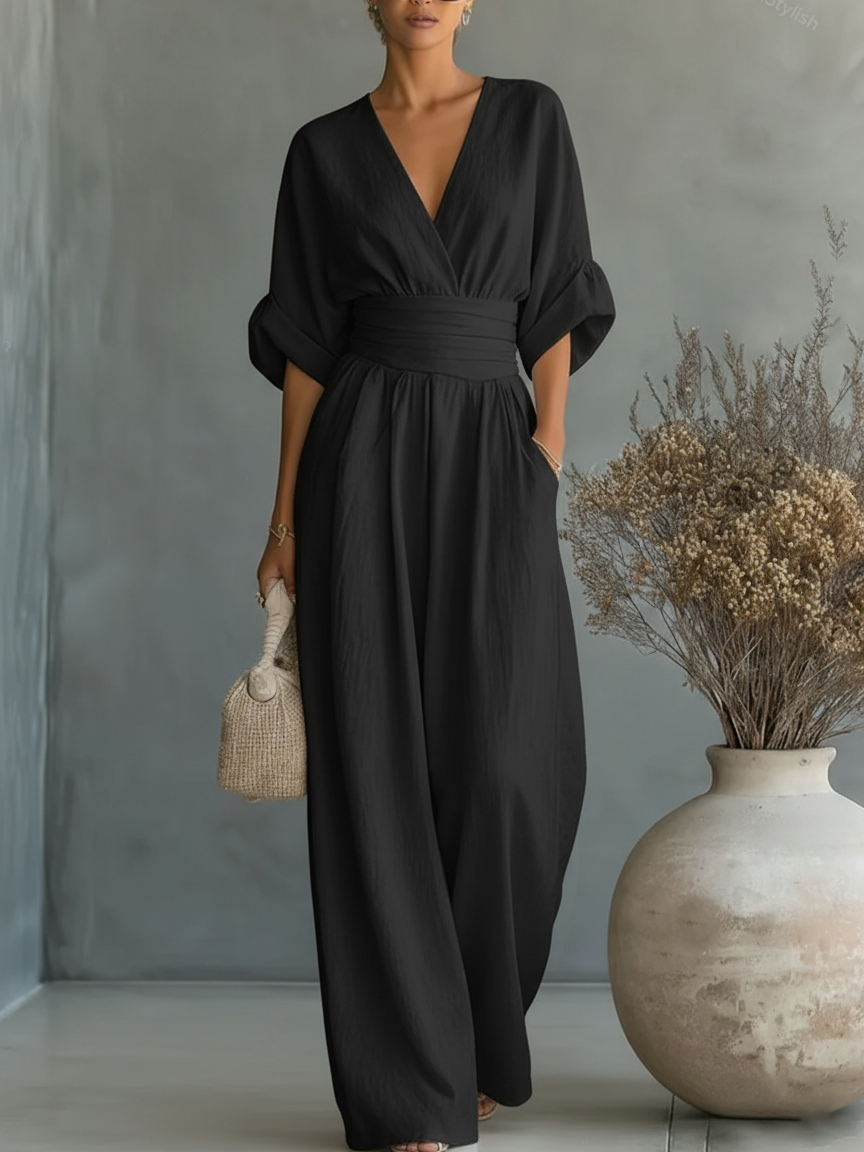Elegante tuta a vita alta con scollo a V