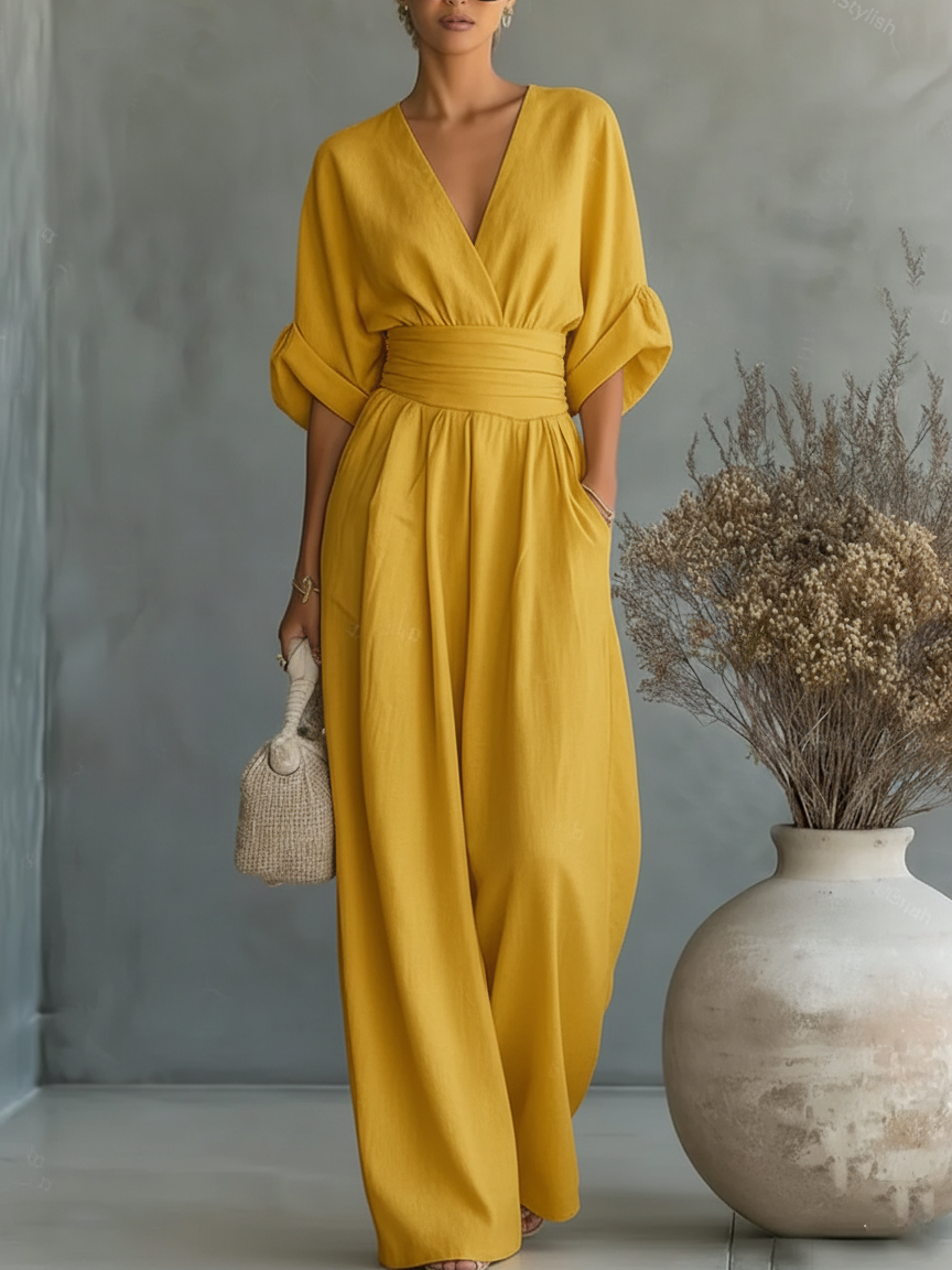Elegante tuta a vita alta con scollo a V
