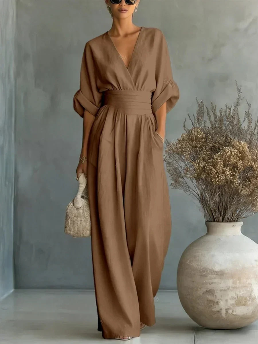Elegante tuta a vita alta con scollo a V