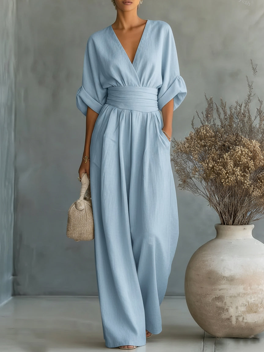 Elegante tuta a vita alta con scollo a V