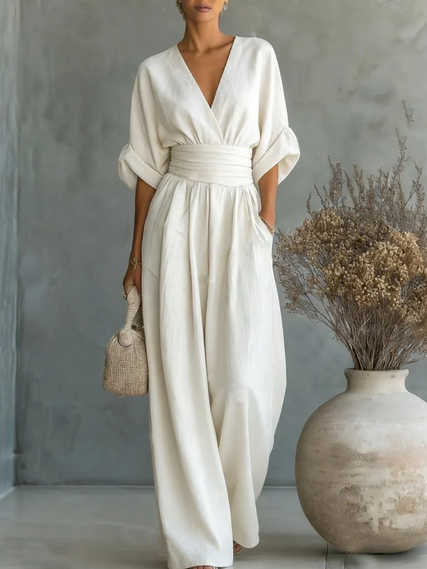 Elegante tuta a vita alta con scollo a V